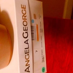 Platform wedge taupe open toe never worn. Smoke free home no pets.